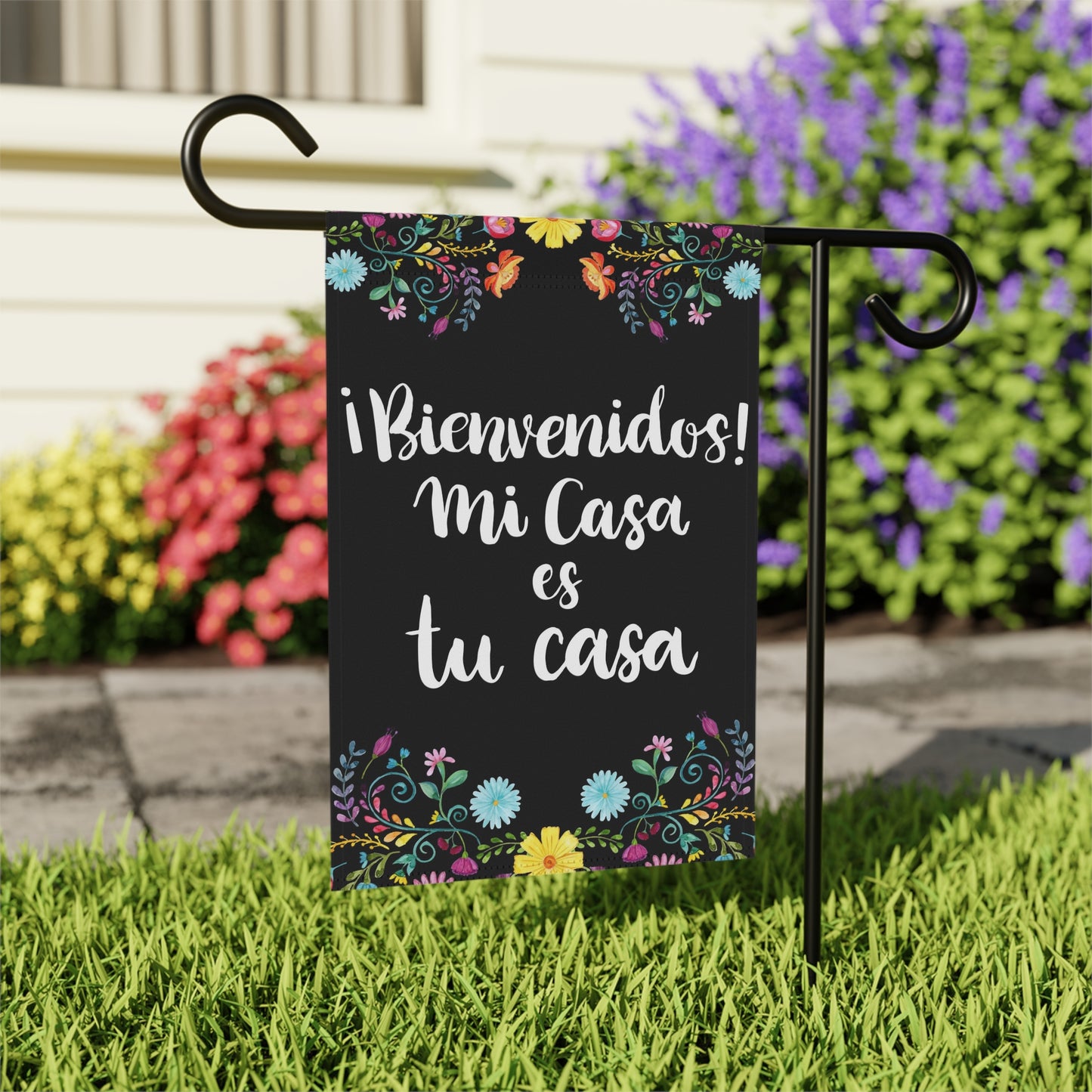 Mi casa es tu casa garden flag with flowers and black background. Hispanic garden flat for Mexican mom, Latin friends or Spain neighbors