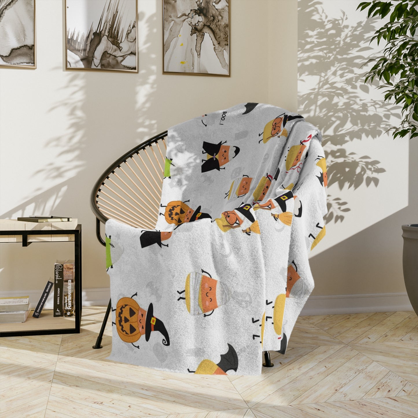 Halloween Blanket with candy corn for spooky season. Candy corns with Halloween costumes for Halloween lovers
