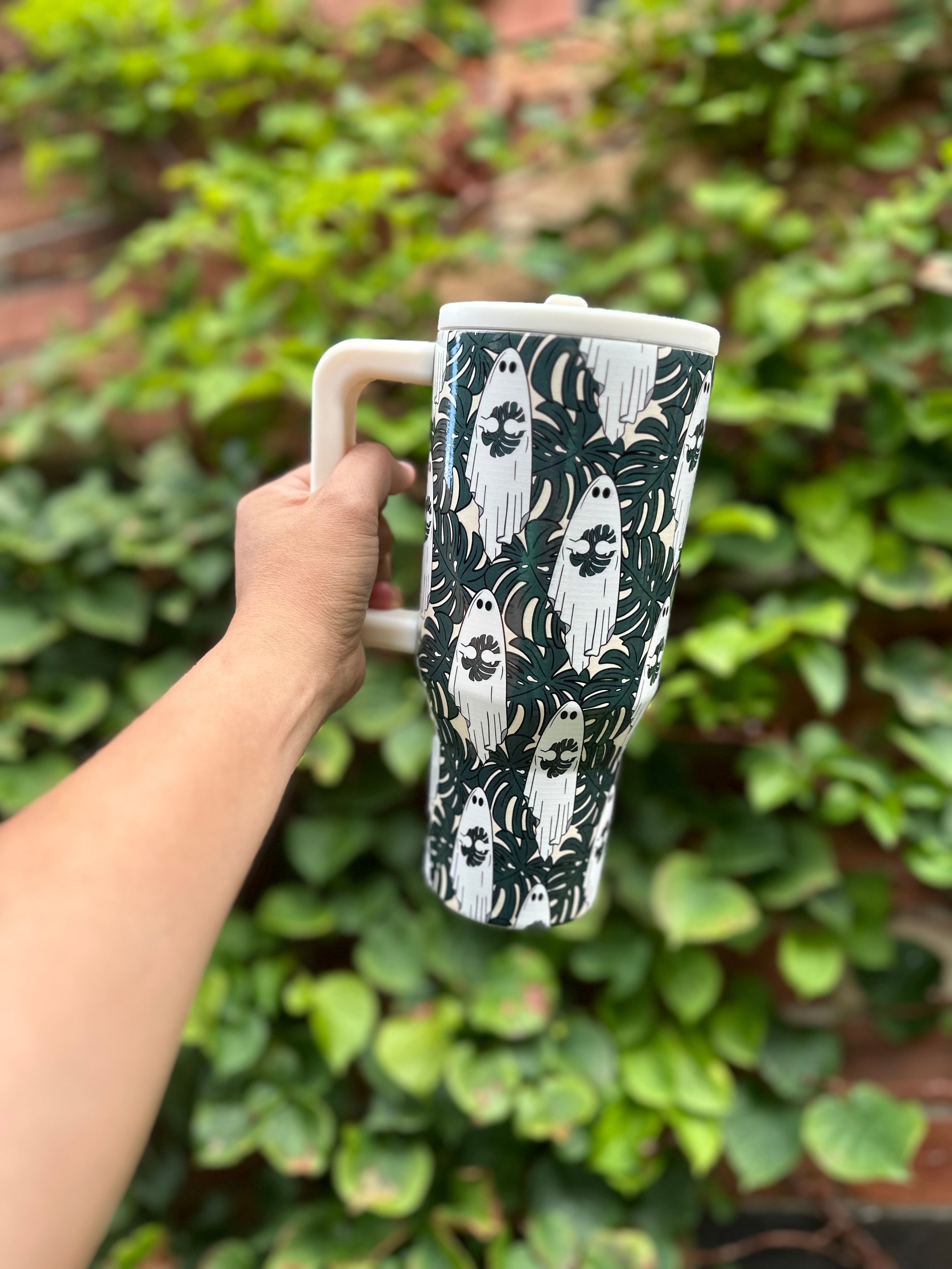 monstera tumbler Ghosts holding Monstera Leaf 32 oz Tumbler with Flip Straw for Hallowe – Ficus & Plants