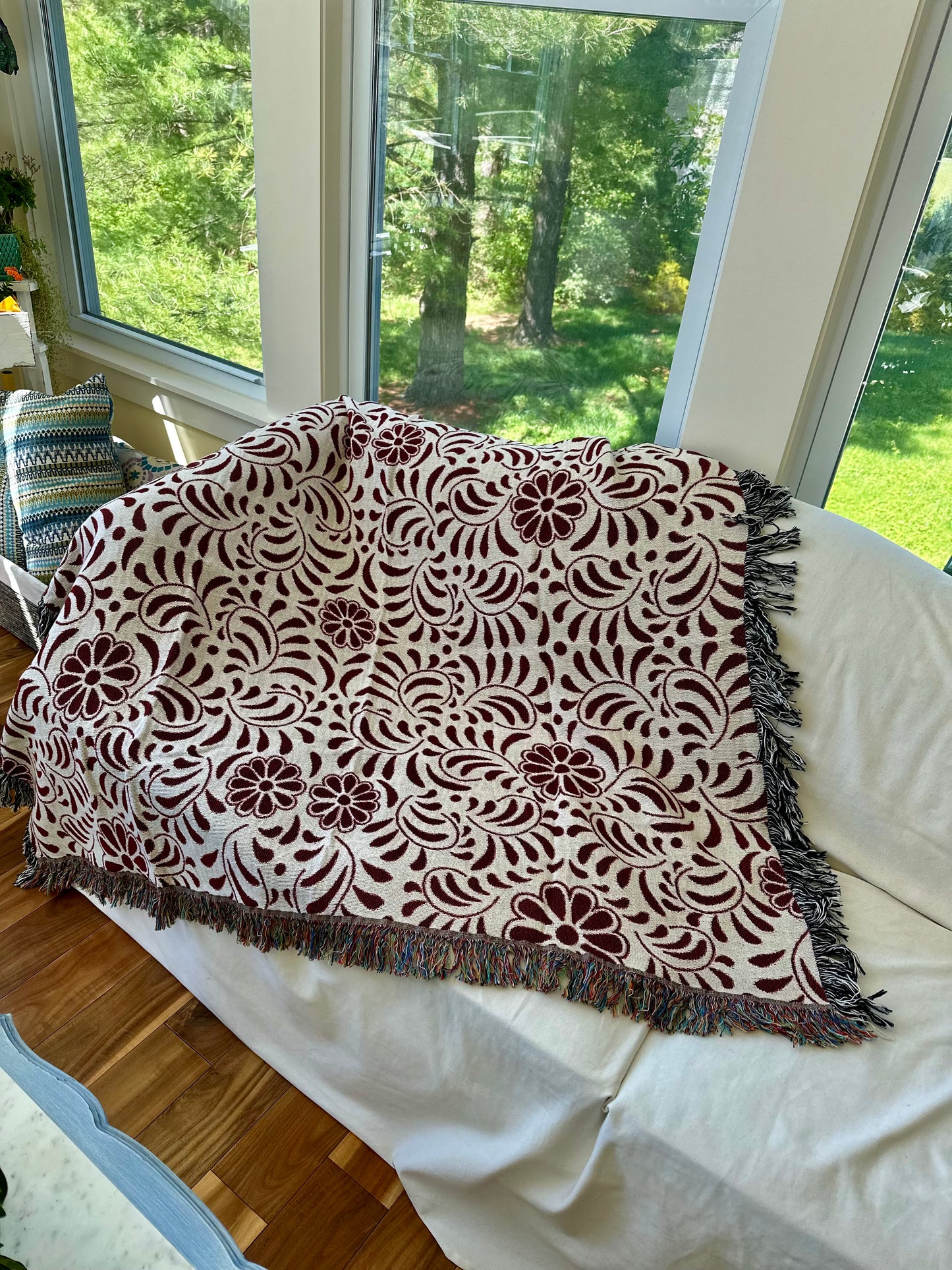 Red and beige woven blanket with Mexican Talavera design. Otomi Red And White Woven Blanket. Mexican blanket