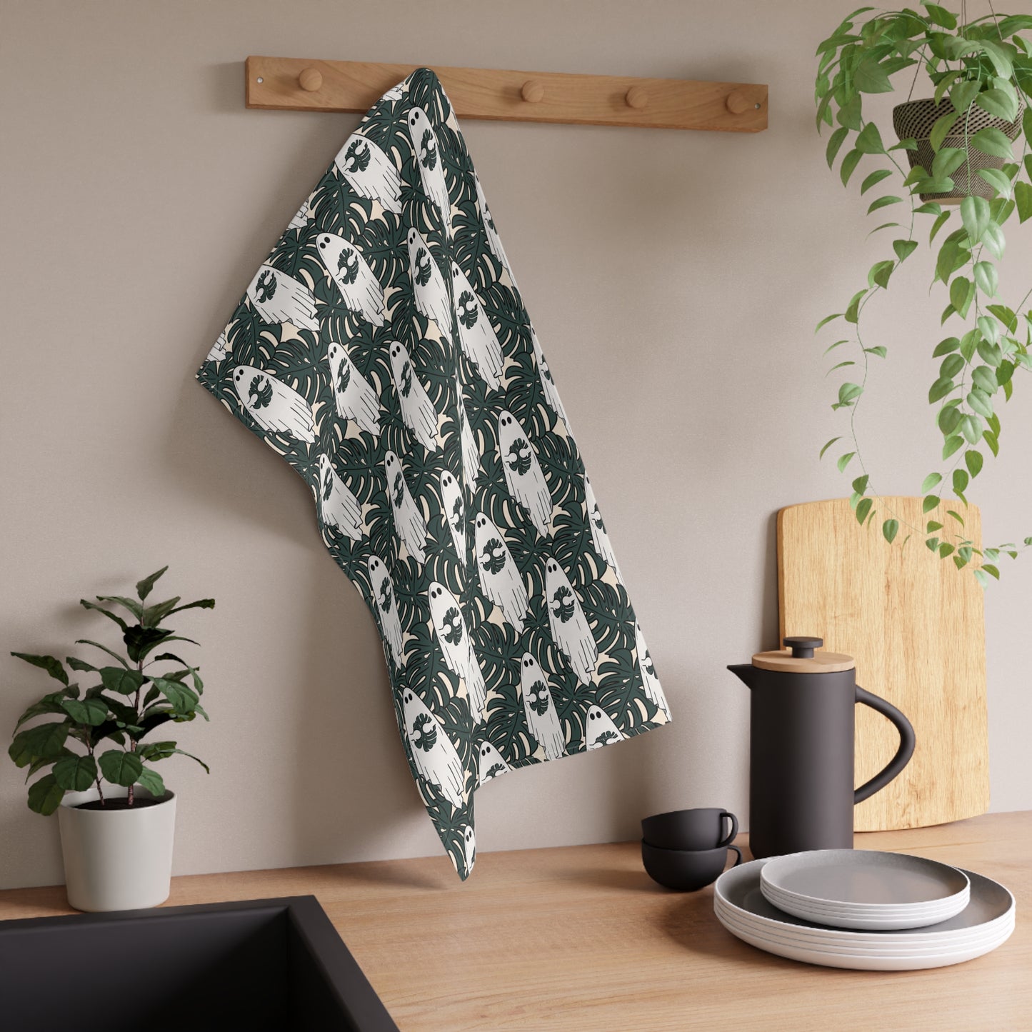 Cute ghost holding monstera leaf tea towel. Set of 2 cotton kitchen towels.