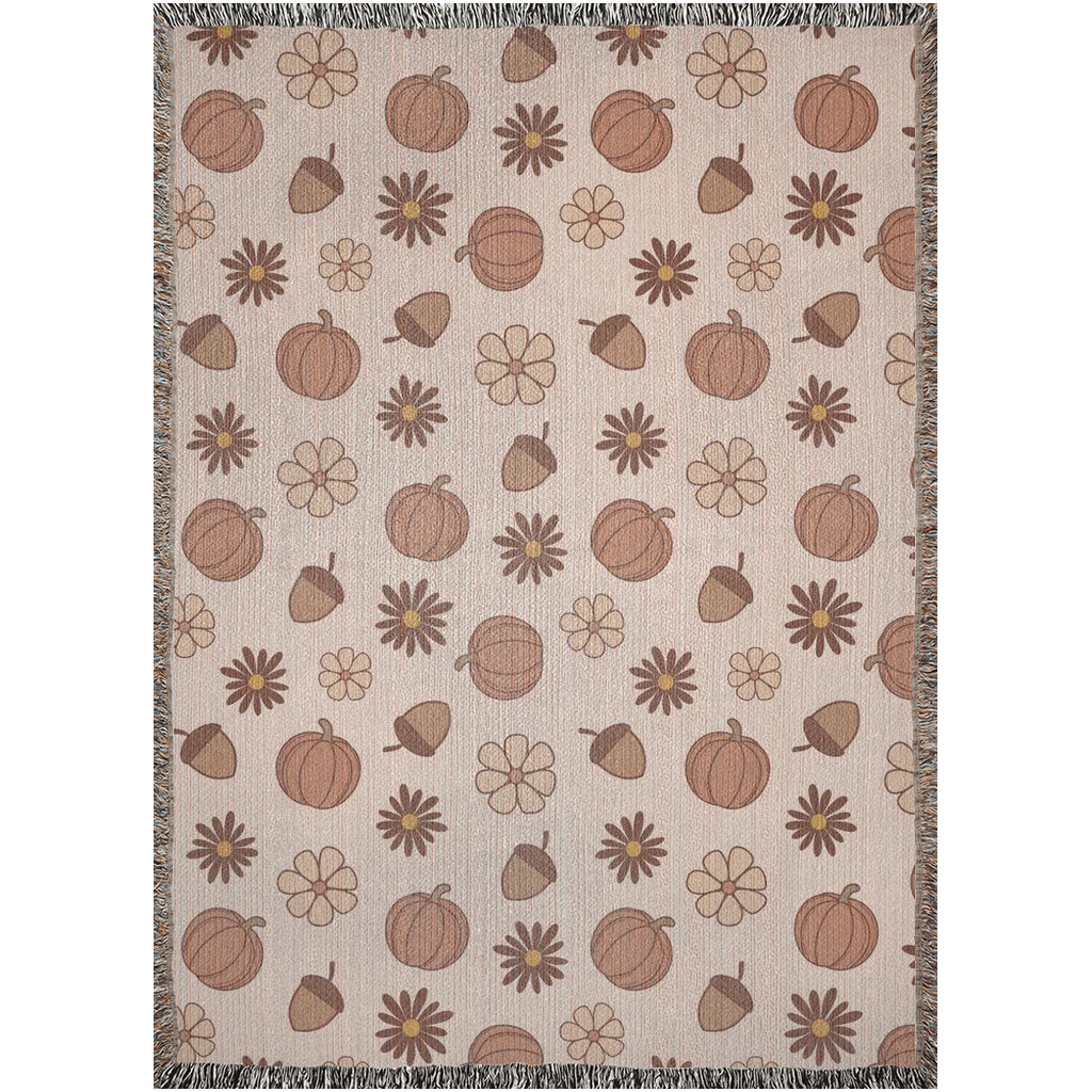 Fall Woven Blanket with pumpkins, acorn and flowers. Autumn home decor.