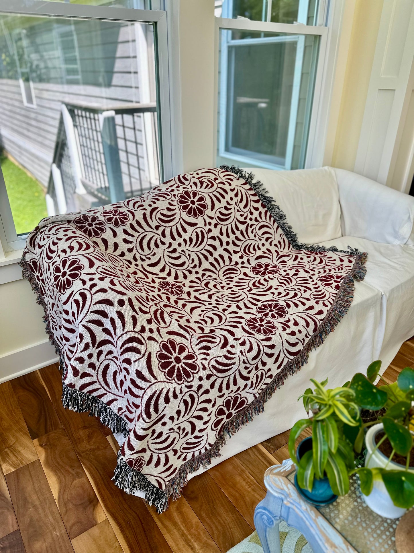 Red and beige woven blanket with Mexican Talavera design. Otomi Red And White Woven Blanket. Mexican blanket