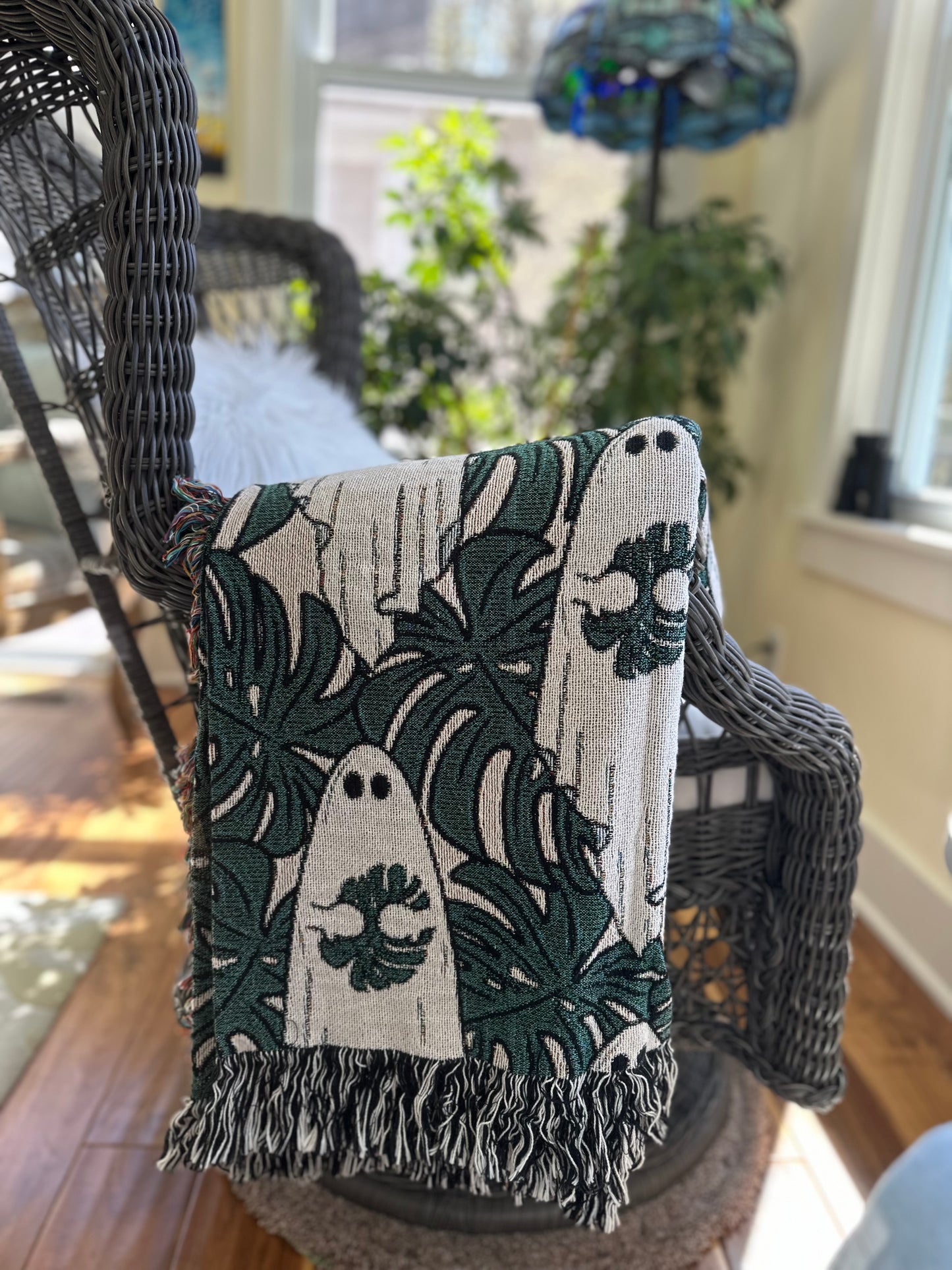 ghosts holding monstera leaf cotton woven blanket. Ghost holding monstera blanket for plant lover, crazy plant lady. Halloween blanket