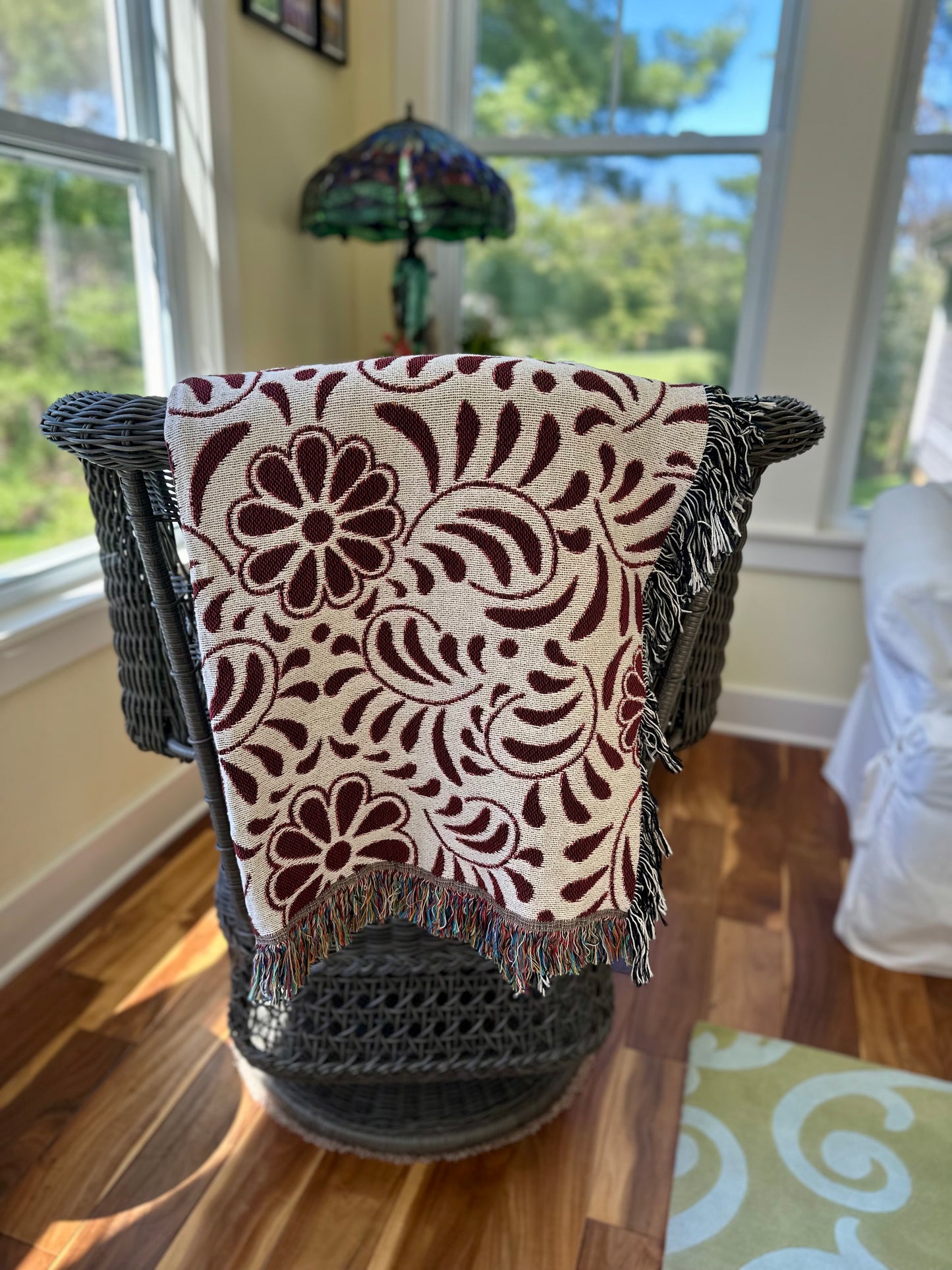 Red and beige woven blanket with Mexican Talavera design. Otomi Red And White Woven Blanket. Mexican blanket