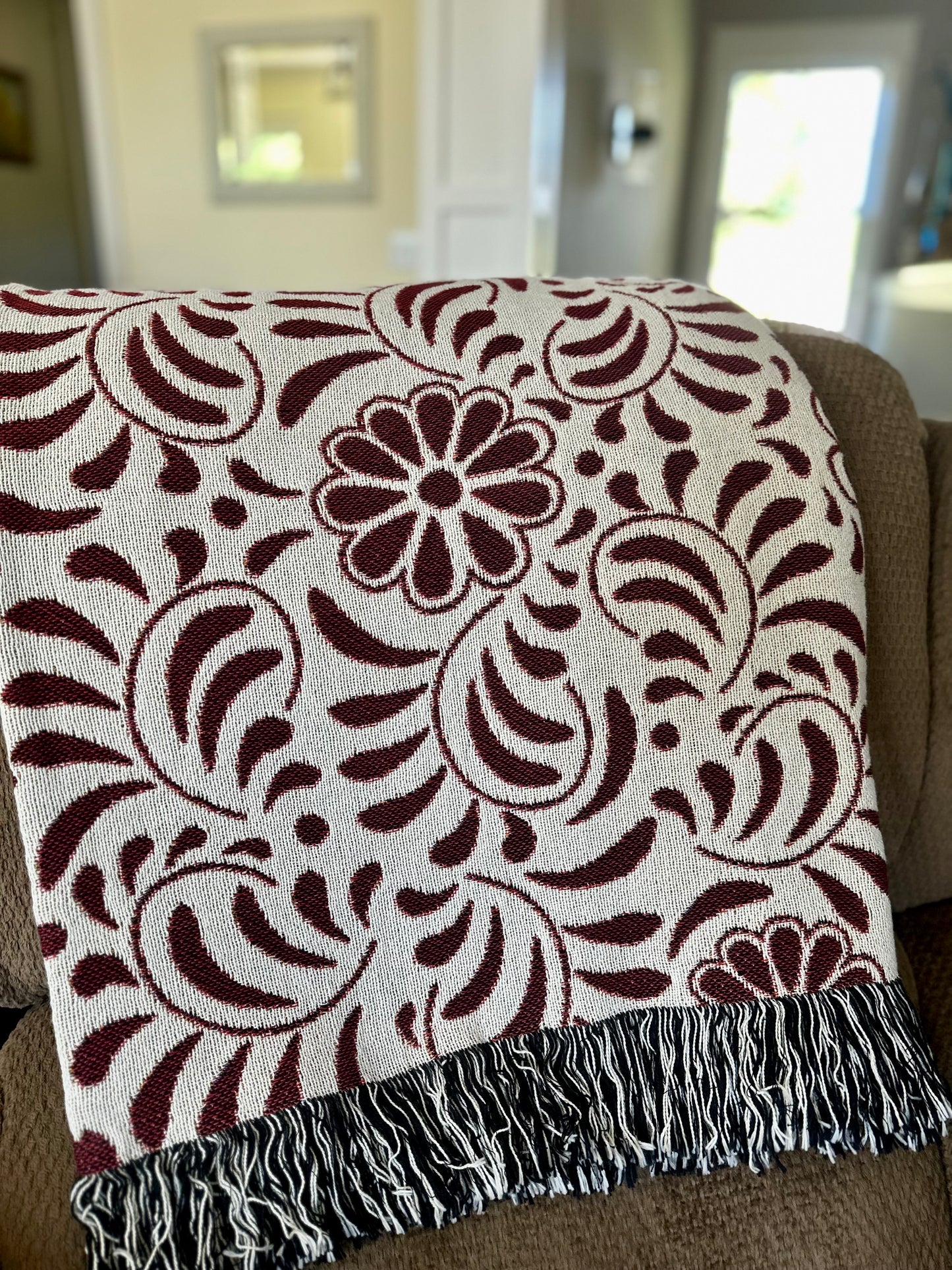 Red and beige woven blanket with Mexican Talavera design. Otomi Red And White Woven Blanket. Mexican blanket