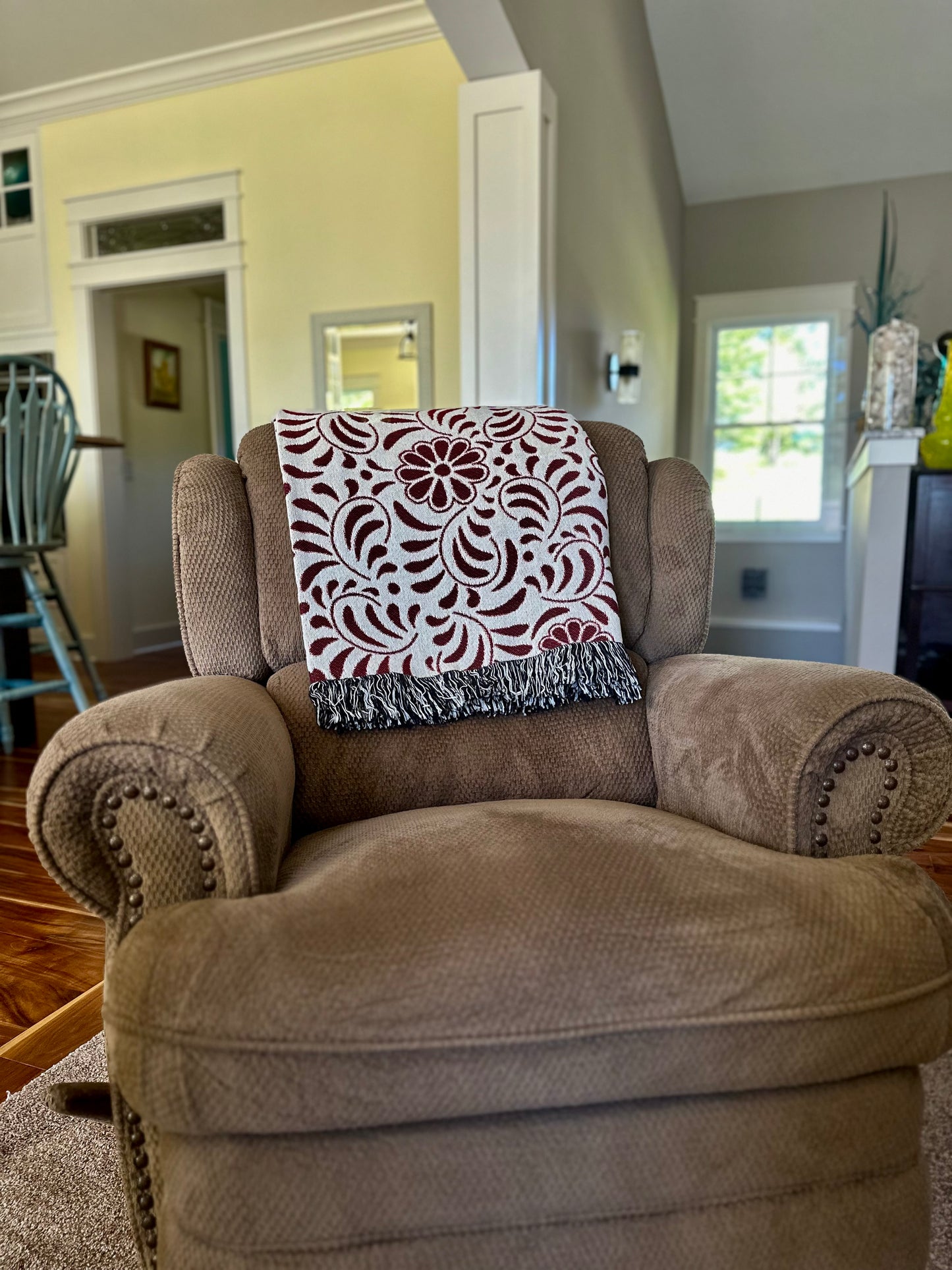 Red and beige woven blanket with Mexican Talavera design. Otomi Red And White Woven Blanket. Mexican blanket