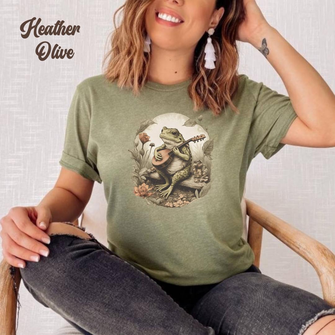 Frog tshirt for her. Toad shirt for him. Frog playing guitar Unisex Jersey Short Sleeve Tee